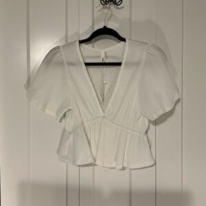Elegant White V-Neck Peplum Blouse